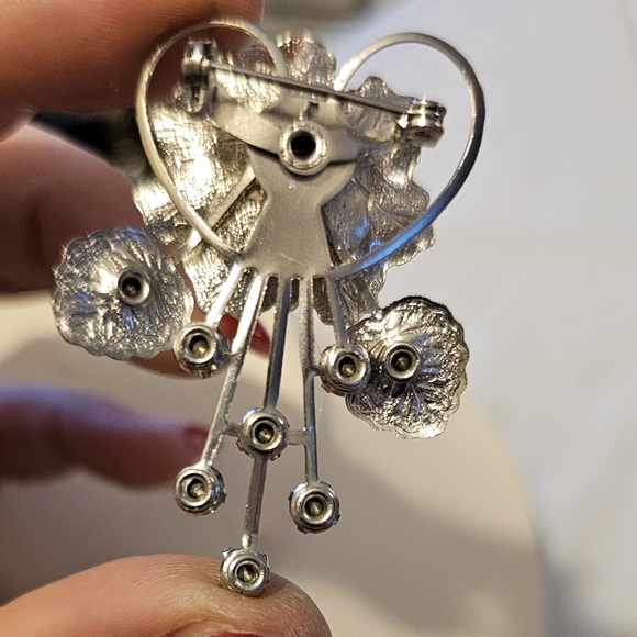 Silvertone and blue rhinestone flower brooch with rivets - Picture 2 of 2